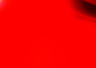 Light Red vector blurred background.