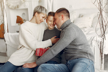 People in a winter clothes in a christmass atmosphere