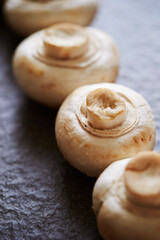 Fresh button mushroom on Marble