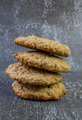 pyramid of oatmeal cookies, homemade cakes, breakfast, on a light background