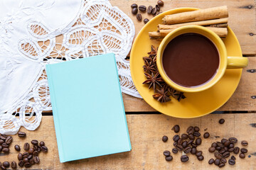 Obraz na płótnie Canvas Top view coffee cup with book