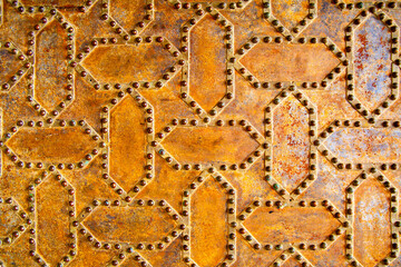 Rusty surface with rivets