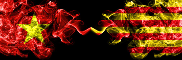 Vietnam, Vietnamese vs Spain, Spanish, Catalonia, Senyera smoke flags side by side.