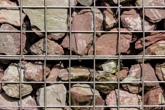 Close up of rocks in a metal cage