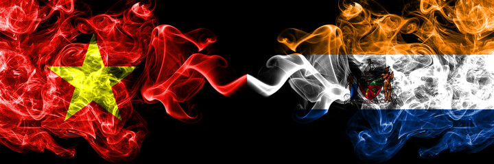 Vietnam, Vietnamese vs United States of America, America, US, USA, American, Albany, New York smoke flags side by side.