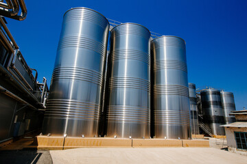 Modern winery. Stainless steel barrels for wine fermentation