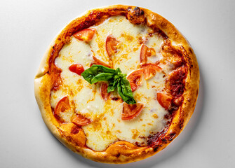 Pizza with Mozzarella cheese, Tomatoes, pepper, Spices. Italian pizza. Pizza Margherita or Margarita on grey background