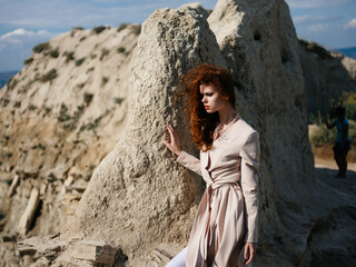 pretty woman posing on the sand model Travel