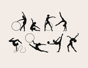 A set of seven vector black silhouettes of gymnasts athletes