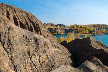Konduki, Tula region, Romancevskie mountains, Abandoned Ushakov quarries. Turquoise water lakes and the mud erosion of the soil looks like mountains. Beautiful natural landscape