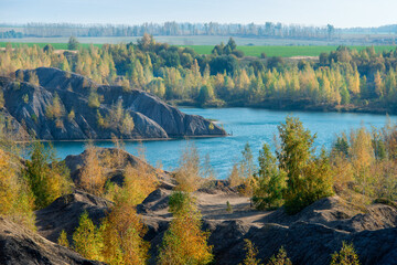 Konduki, Tula region, Romancevskie mountains, Abandoned Ushakov quarries. Turquoise water lakes and the mud erosion of the soil looks like mountains. Beautiful natural landscape