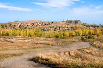 Konduki, Tula region, Romancevskie mountains, Abandoned Ushakov quarries. The mud erosion of the soil looks like mountains. The area is overgrown with young birches. Beautiful natural landscape