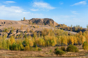Konduki, Tula region, Romancevskie mountains, Abandoned Ushakov quarries. The mud erosion of the soil looks like mountains. The area is overgrown with young birches. Beautiful natural landscape