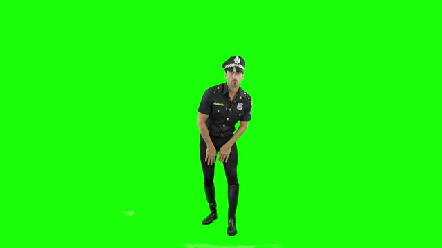 Hombre policia bailando en chroma key pantalla verde 