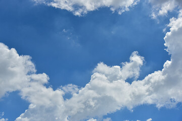 Beautiful white clouds on blue sky background