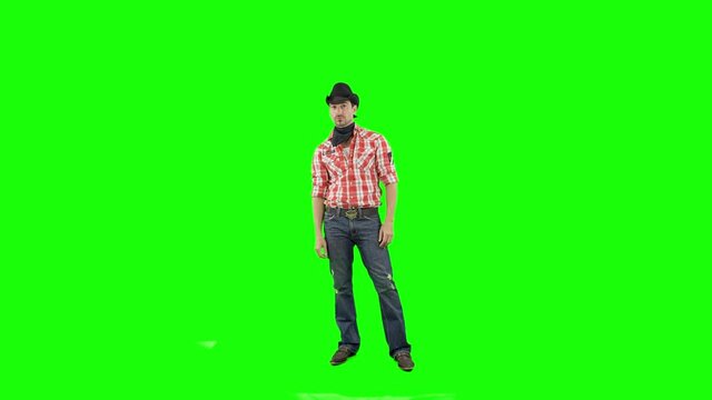 Hombre vaquero bailando en chroma key pantalla verde 
