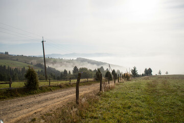 Fototapeta premium view of the mountains in the fog
