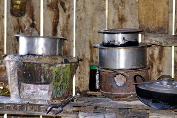 Pots cooking in a kitchen in Nyaungshwe, Myanmar
