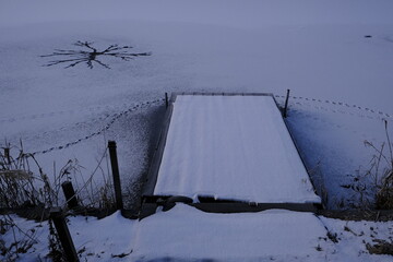 Radial holes and piers in an icy pond