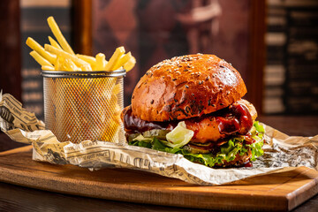 tasty burger with french fries and beer