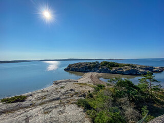 Fototapeta na wymiar Beach with both sides Water between two Islands in Sweden - Landscape Photography 