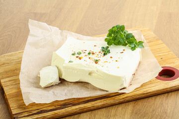 Greek Feta cheese over board