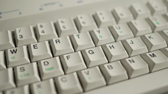 Panning Vintage Retro Computer White Keyboard Closeup