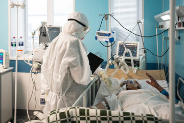 A medical staff member works at the intensive care unit for patients suffering from the coronavirus...
