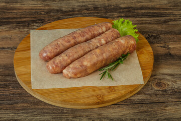 Raw pork meat sausages for grill