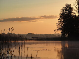 Fototapeta premium Sunrise at the lake with bridge