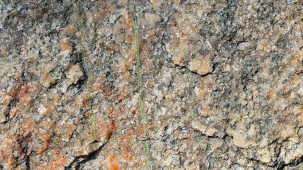 Granite stone surface texture. Texture of rough granit stone surface background. Abstract background from natural material