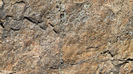 Granite surface. Texture of granite stone. Cracked natural stone surface. Copy space