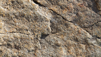 Granite surface. Texture of granite stone. Cracked natural stone surface. Copy space