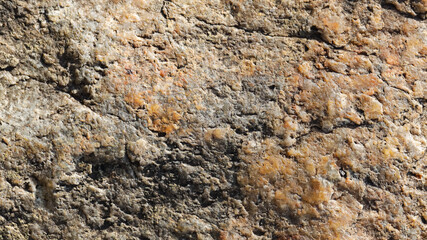 Granite surface. Texture of granite stone. Cracked natural stone surface. Copy space