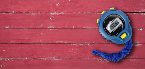 Sports equipment - Blue Stopwatch red background