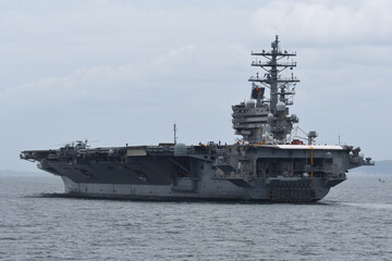 United States Navy aircraft carrier USS Ronald Reagan sailing in Tokyo Bay.