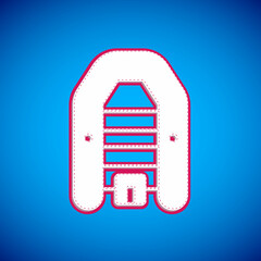 White Inflatable boat with outboard motor icon isolated on blue background. Vector