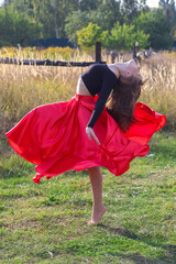 Girl dance in red dress