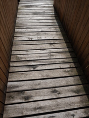 Wet wooden path for wheelchairs, another castle entrance.