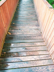 Wet wooden path for wheelchairs, another castle entrance.