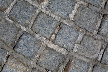 Texture with rough squares in stone masonry