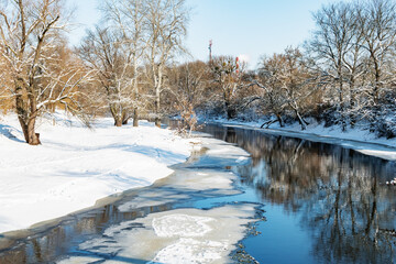 A river covered with ice on a sunny day