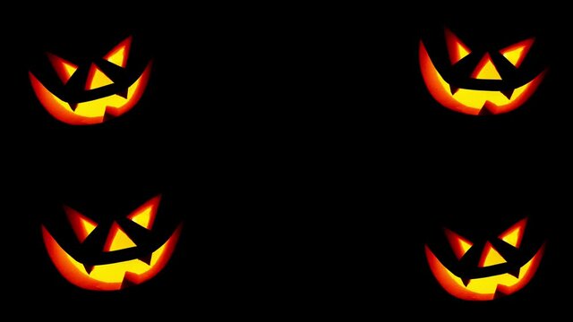 Scary face on blinking on black background. Jack-o-lantern glowing in the dark. Halloween pumpkin