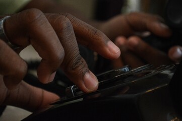 close up of hands on a phone