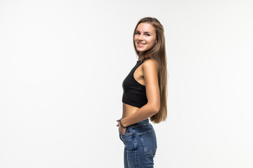 Portrait of pretty young woman standing against white background