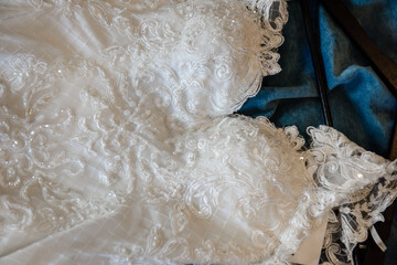 Lace white dress of the bride. The bride's wedding clothes are waiting for the ceremony.