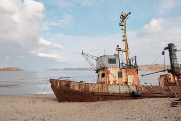old boat on the beach