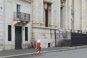 Rome Street View with Walking Woman in Red Dress at Piazza Navona Square