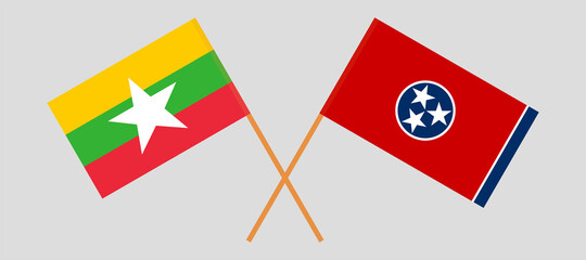 Crossed flags of Myanmar and the State of Tennessee. Official colors. Correct proportion