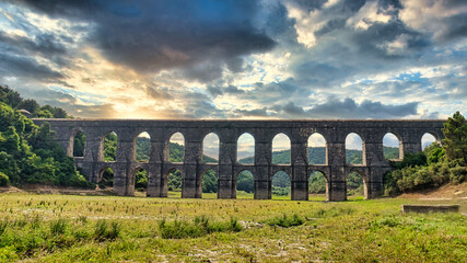 Maglova Aqueduct built by Master Ottoman Architect Mimar Sinan, Beautiful sunset aqueduct